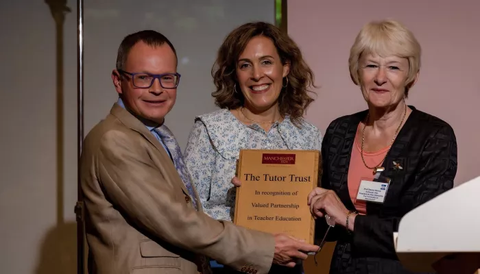 Professor Dame Nancy Rothwell presents the award to Nick and Abigail