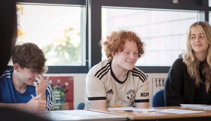 Secondary school pupils enjoying a tuition session in an alternative education provision.