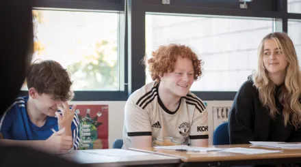 Secondary school pupils enjoying a tuition session in an alternative education provision.
