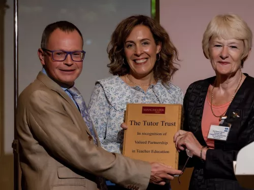 Professor Dame Nancy Rothwell presents the award to Nick and Abigail